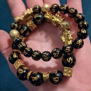 Two glass and metal Chinese beaded stretch bracelets